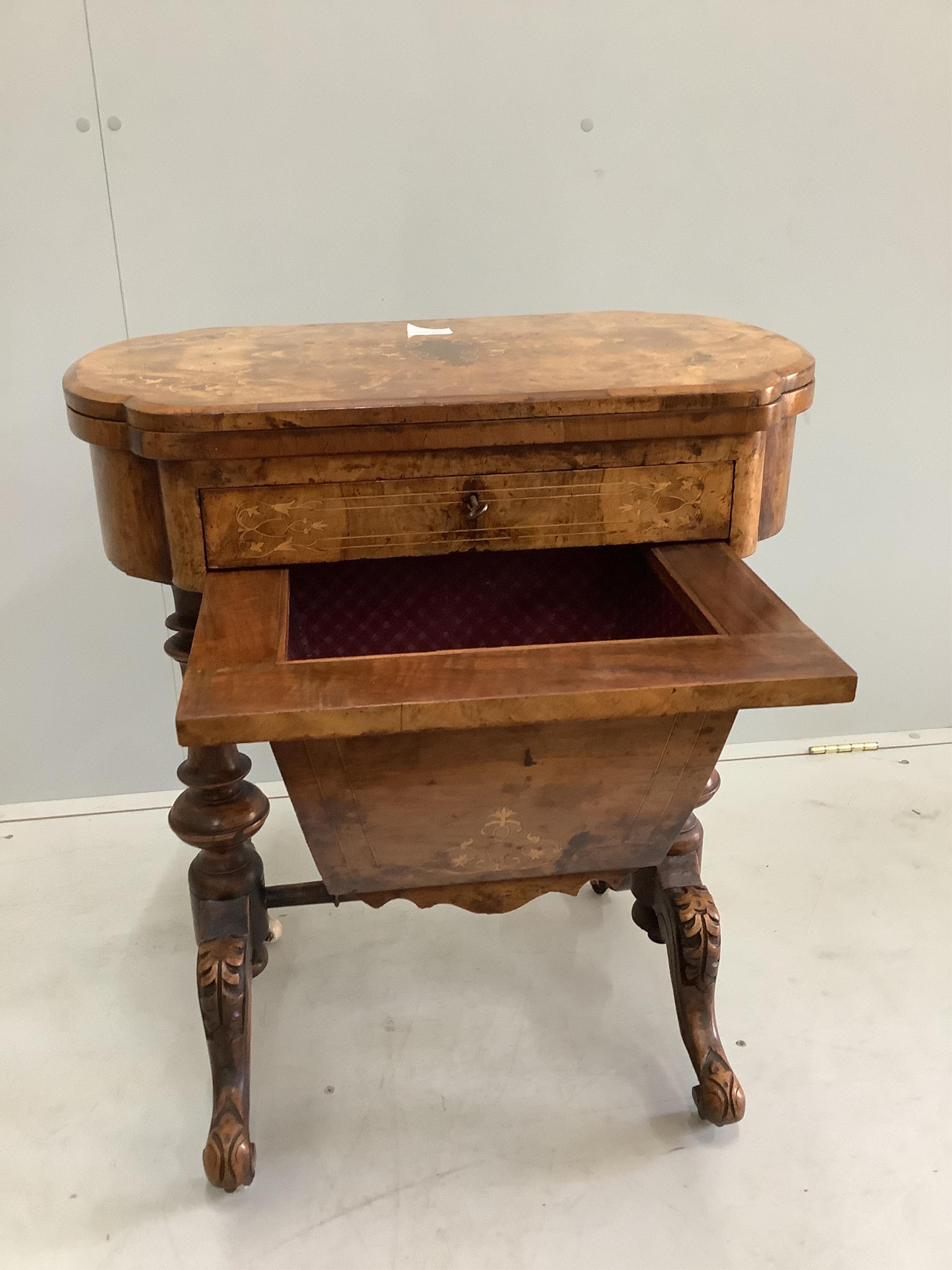 A Victorian marquetry inlaid walnut games / work table, width 61cm, depth 40cm, height 73cm